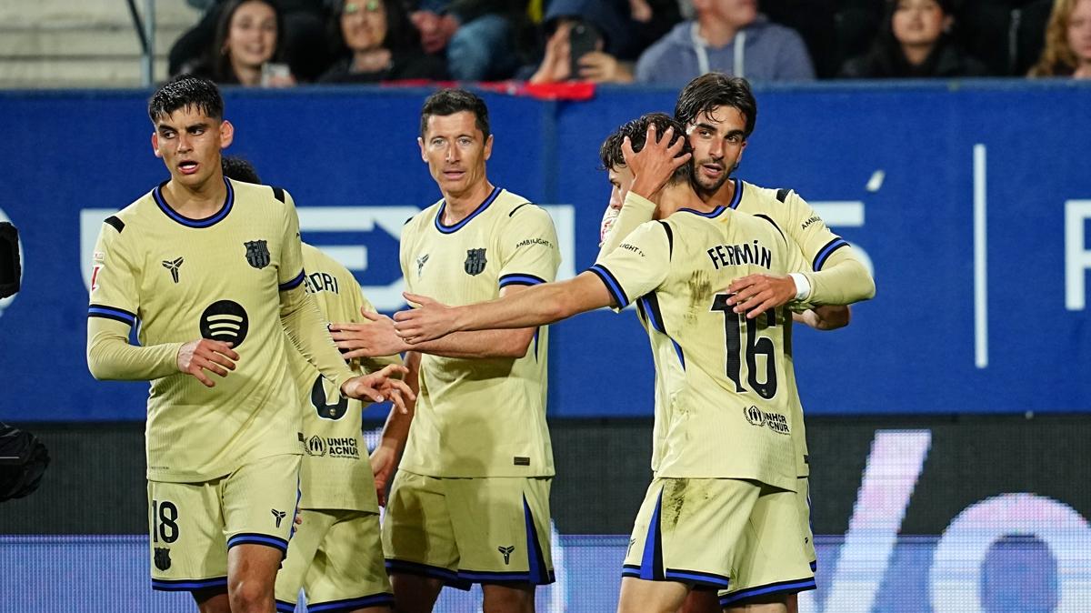 Osasuna 1-2 Barcelona: Lewandowski and Torres strike late to put Barca on brink of title